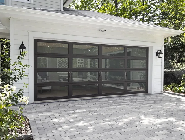 Alafaya Garage Door Repair design specialist presenting custom garage door options to Alafaya homeowner