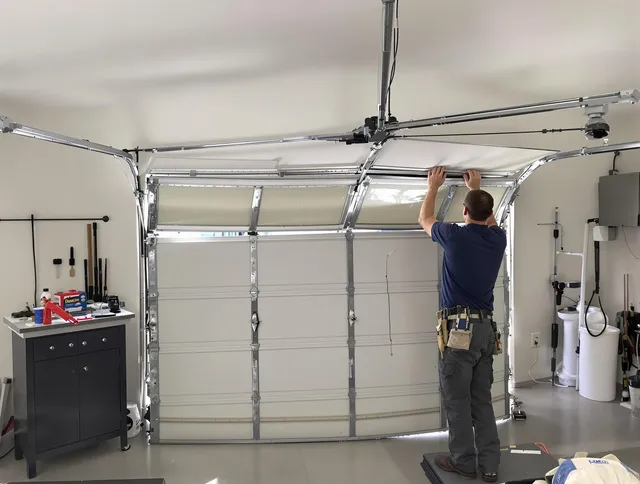 Alafaya Garage Door Repair specialist performing precise section replacement on Alafaya garage door