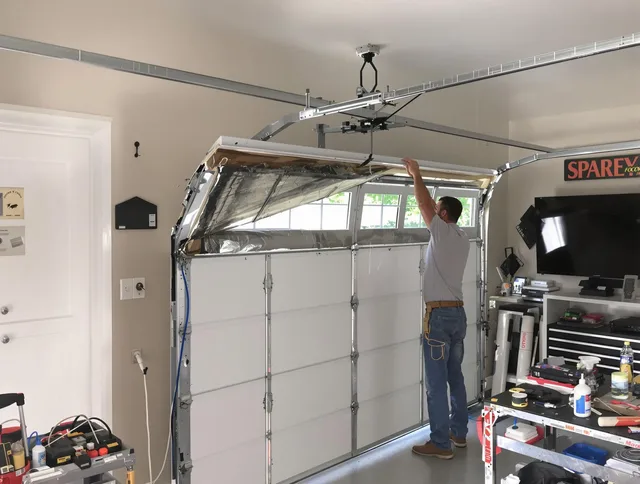 Garage door section replacement by Alafaya Garage Door Repair in Alafaya