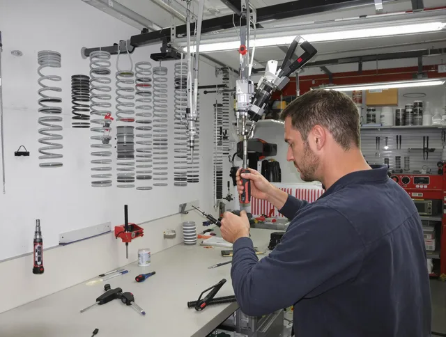 Alafaya Garage Door Repair safety certified technician performing precision spring replacement in Alafaya